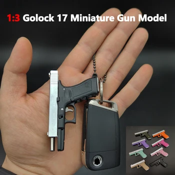 Многоцветная Игрушка-Непоседа Glock 17 Брелок Мини Металлический Glock G17 Брелок Пистолет Портативный Выброс Снаряда Сборка Разборка Изображение